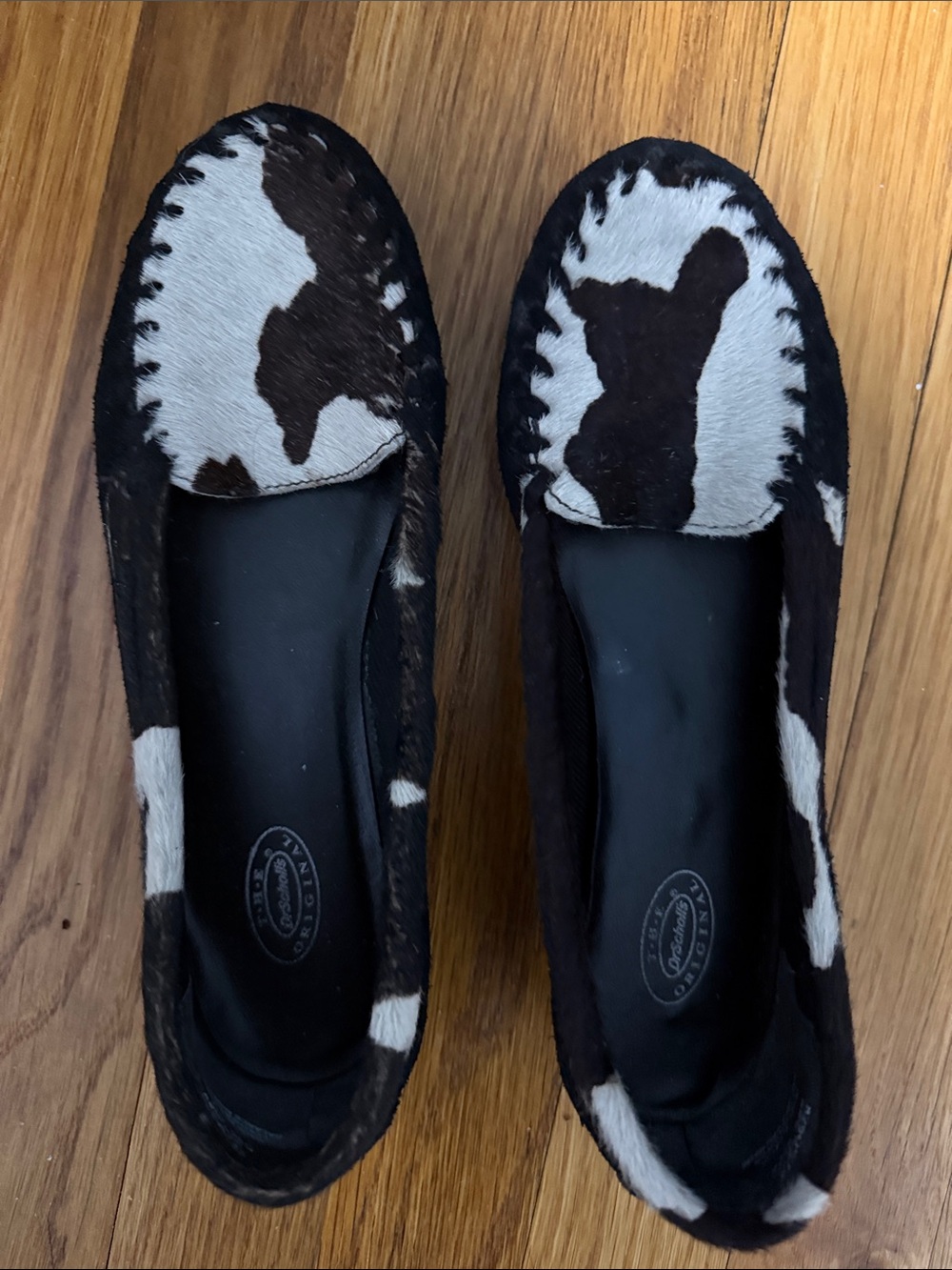 Dr. Scholl's Black and White Cowhide Moccasin Flats